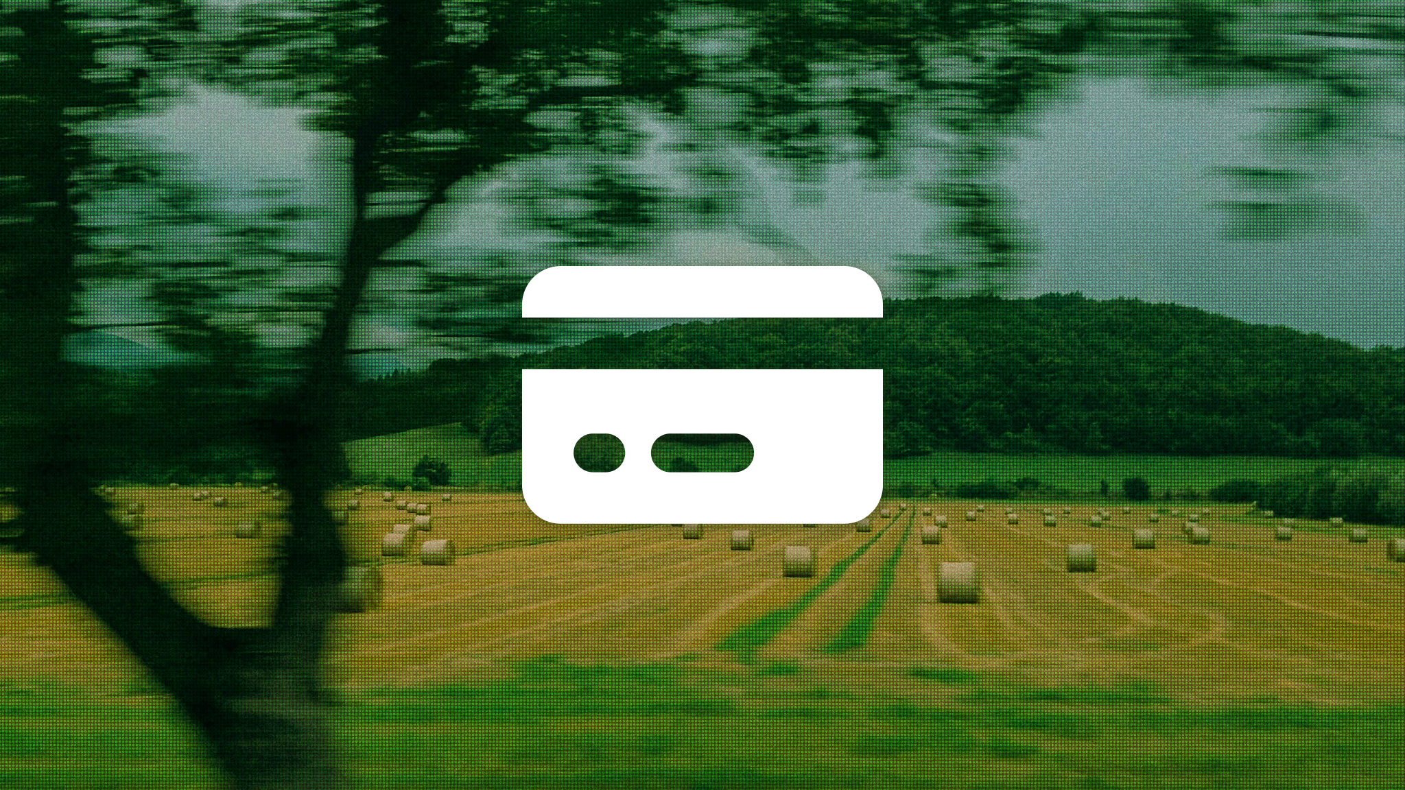 Credit card icon over a green countryside landscape representing how expense tracking should feel effortless in 2025